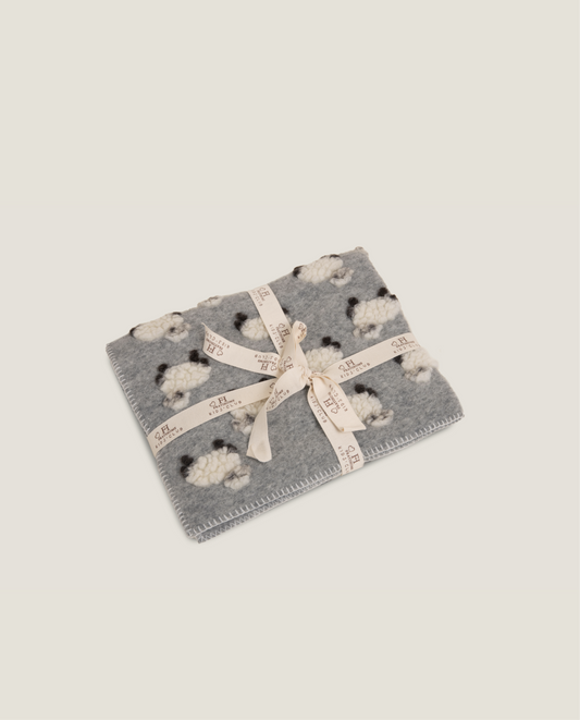Plaid per bambini con pecorelle su sfondo grigio